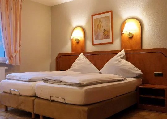 Schlafzimmer in einer Ferienwohnung im Haus Dallacker in Duhnen