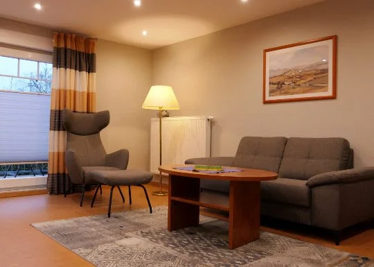 Wohnzimmer in einer Ferienwohnung im Haus Dallacker in Duhnen